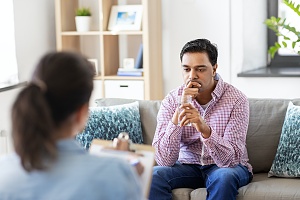 man in one on one counseling session in outpatient programs