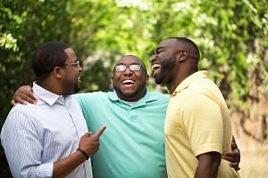 Happy guys supporting patient going through Medical assisted treatment